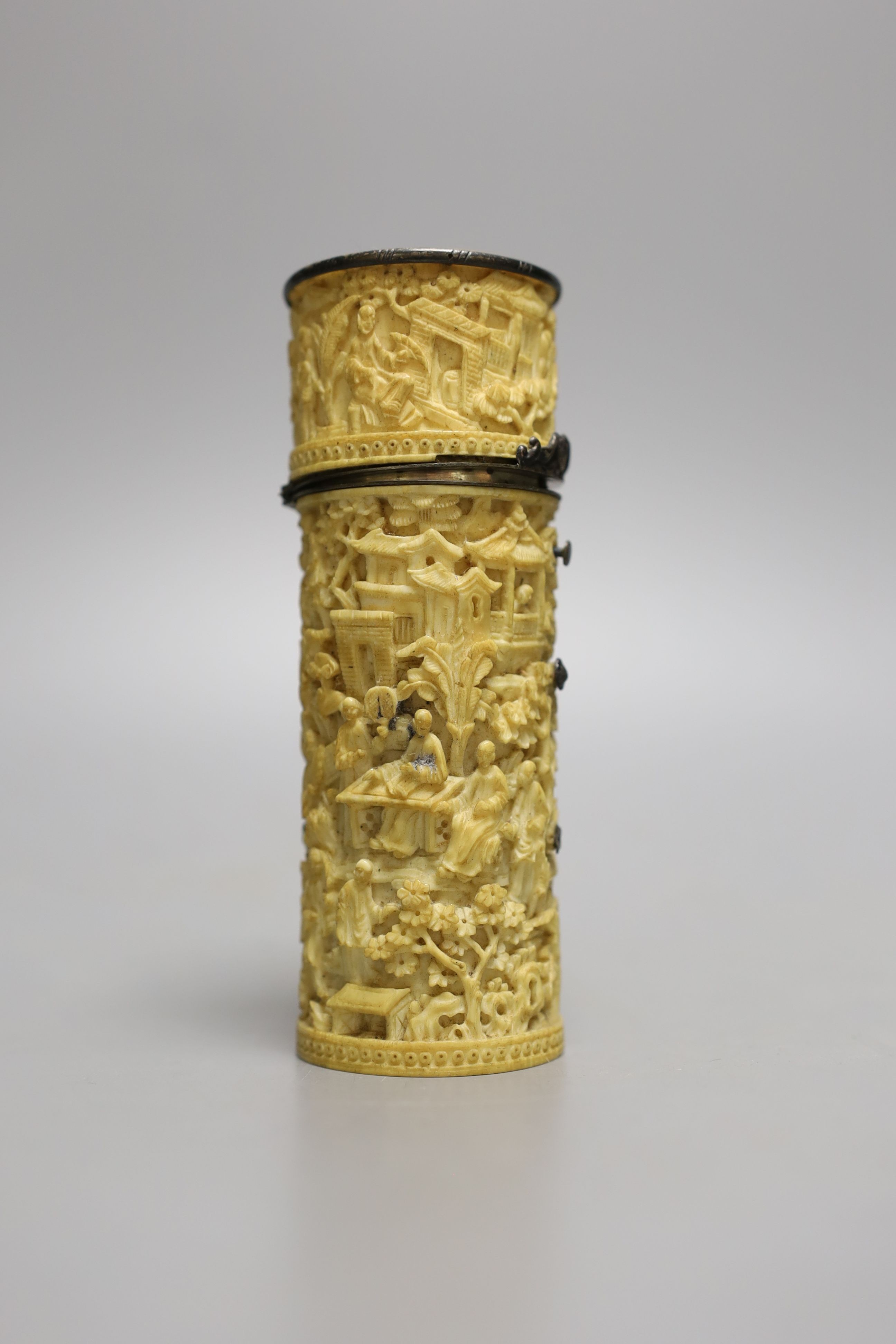 A 19th century carved Cantonese export ivory case and mother-of-pearl games counters - 12.5cm tall